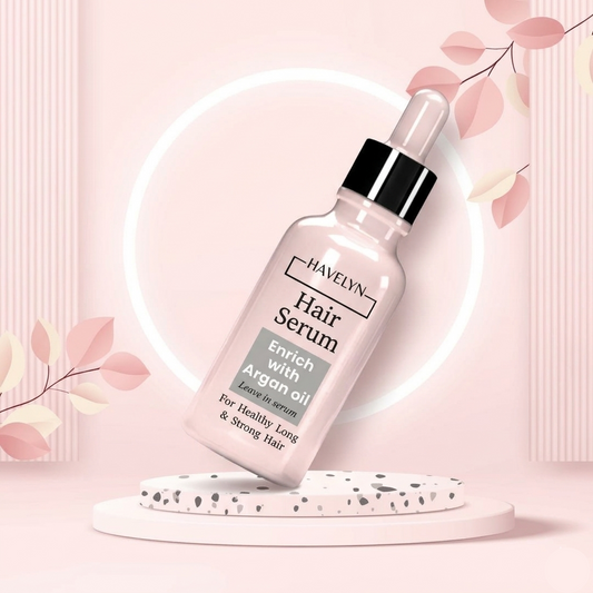 Hair serum bottle with dropper on a pink background