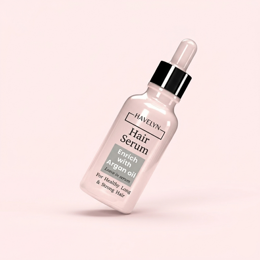 Hair serum bottle with dropper on a light pink background